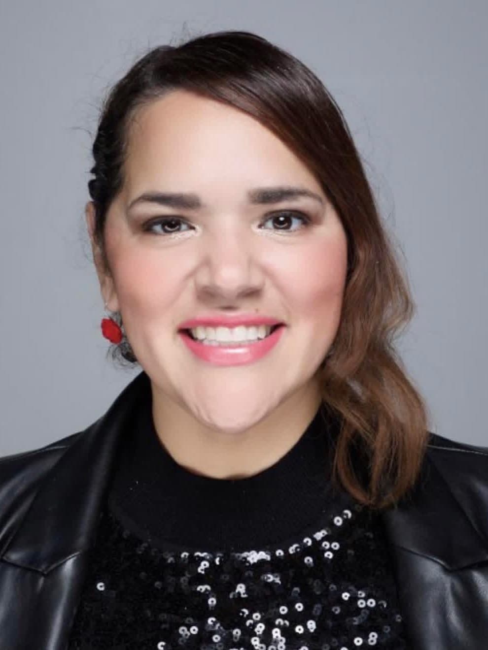 Studio headshot of Miriam D. Rivera